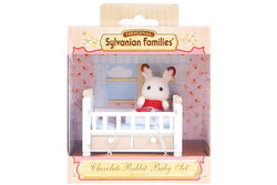 Sylvanian Families: Chocolate Rabbit Baby and Crib Bed Set.