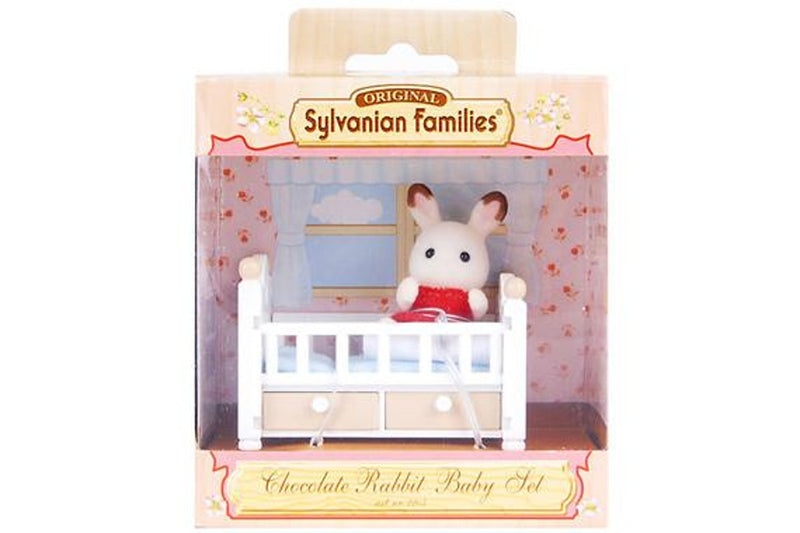 Sylvanian Families: Chocolate Rabbit Baby and Crib Bed Set.